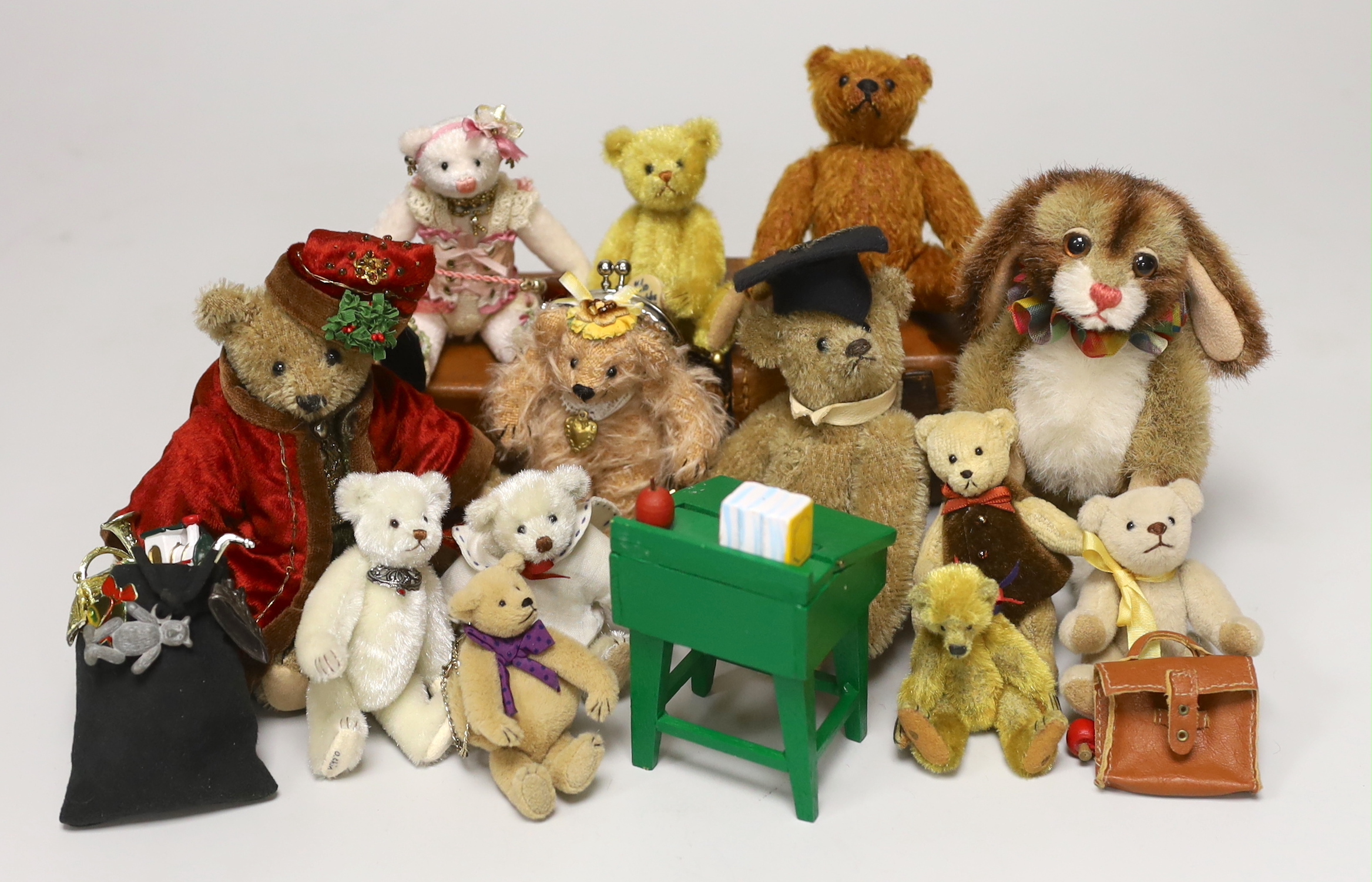 Twelve miniature American artist's bears and one rabbit